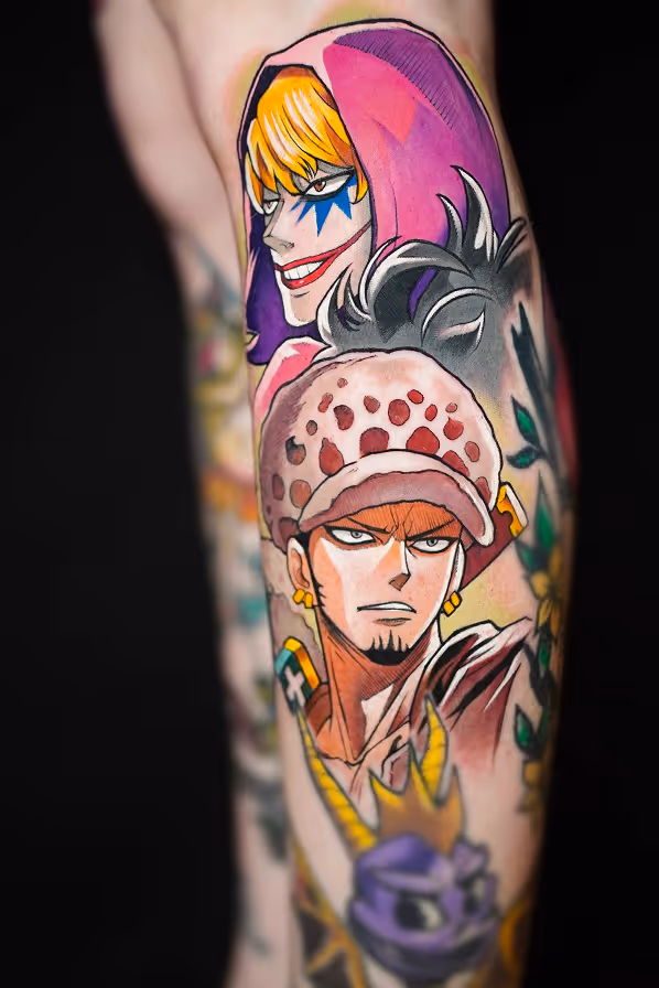 Colorful tattoo on an arm depicting two anime characters Donquixote Doflamingo and Trafalgar D. Water Law