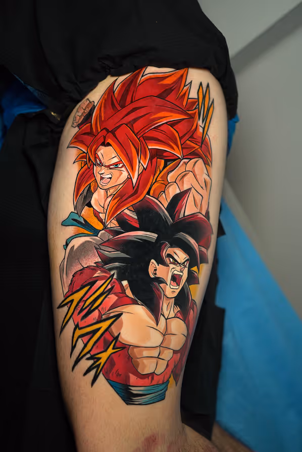 Tattoo of two Son Goku characters with spiky red and black hair, muscular build, and dynamic expressions on an upper arm.